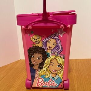 Barbie Pink Rolling Organizer and two bags of random Barbie or doll clothes.